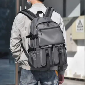 Grey water-resistant large capacity backpack for daily commuting and outdoor usage