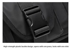 Detail of high-strength plastic buckle and durable nylon strap on black messenger bag