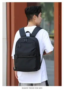 Close-up of stylish black business backpack with waterproof nylon and zipper details