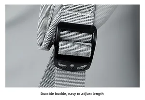 Detail of adjustable gray nylon backpack strap with a durable black plastic buckle