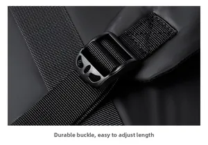 Macro shot of a sturdy black plastic buckle and durable nylon strap on a backpack