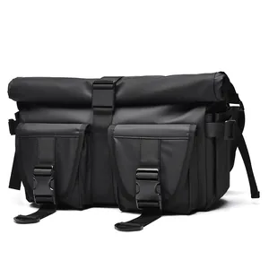 Waterproof black roll-top messenger bag with tactical buckles and adjustable straps
