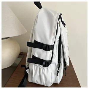 Close-up of white fashion backpack with black adjustable buckles and side water bottle pocket