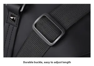 Detailed macro view of the thick adjustable buckle and nylon strap on the travel bag