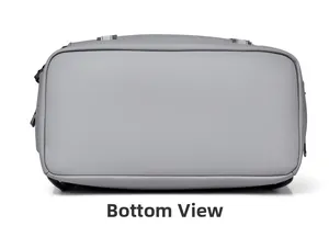 Bottom view of the gray nylon backpack showing reinforced stitching and durable base fabric