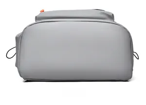 Detailed bottom view of gray oxford fabric backpack showing durable texture and base shape