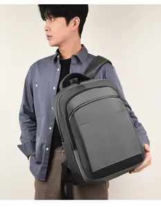 Deep gray business backpack with high-density fabric and ergonomic shoulder straps