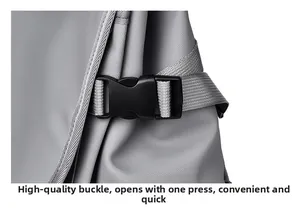 Detail of high-strength plastic buckle for quick release on grey durable backpack