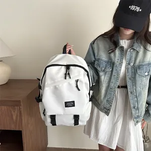 Minimalist white high-capacity backpack with black logo label and side buckles