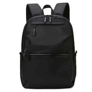 Minimalist black waterproof business laptop backpack with multiple zipper pockets