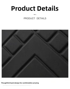 Detail of ergonomic back padding on black backpack with breathable geometric mesh design