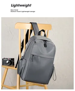 Detail of grey waterproof nylon backpack with breathable mesh straps and side pockets