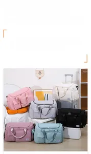 Detail of multi-functional travel bag with diamond quilted texture and wide open design