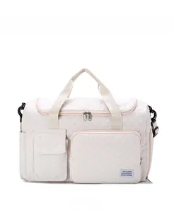 Quilted beige travel bag featuring main zipper compartment and front flap pocket