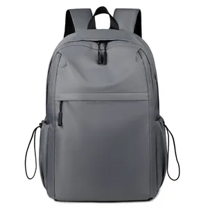 Minimalist dark grey water-resistant nylon backpack for daily commuting and travel use