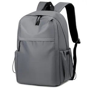 Minimalist dark gray waterproof backpack with front zipper pocket and side drawstring pockets