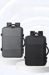 Waterproof expandable laptop backpack in black and gray for business travel use