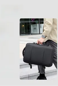 Detail showing waterproof high-density fabric and minimalist business backpack texture