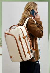 Detail view of stylish laptop backpack with USB charging port and ergonomic straps
