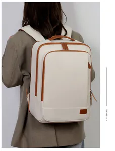 Back view of a beige large capacity travel backpack with brown leather trim detailing