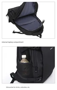 Detail showing the internal padded laptop compartment and mesh side pocket of the black backpack