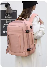 Mochila rosa impermeable para portátil con puerto USB y hebilla ajustable de viaje