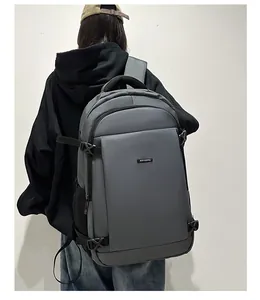 Detail of gray waterproof fabric and side buckle on this minimalist business backpack