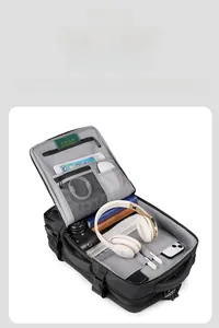 Internal view of the multi-compartment travel backpack with organized electronic gear