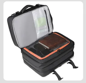 Detail of expandable travel backpack interior showing mesh pockets and large storage space