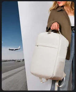 Close-up of minimalist white business backpack with premium matte finish and silver zippers