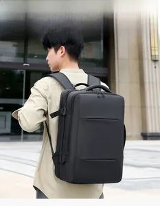 Outdoor view of a black expandable travel backpack with ergonomic breathable S-straps