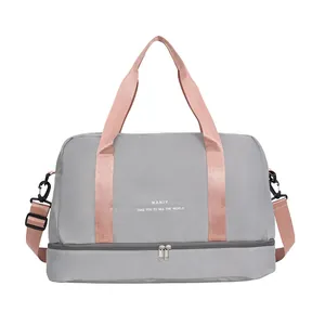 Bolsa de viaje gris de gran capacidad con correas rosas y compartimento para zapatos