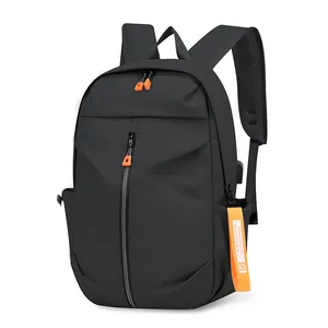 Minimalist black laptop backpack with vibrant orange accents and side pockets