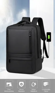 Waterproof laptop backpack detail showing external USB charging port and dual zippers