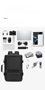 Flat lay view of travel backpack showing large capacity and 15.6 inch laptop compartment