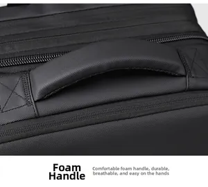 Close-up of a padded foam handle on a black travel backpack for durable and comfy grip