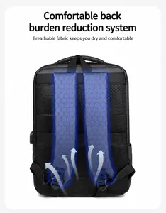 Detail of ergonomic breathable mesh back panel and USB charging port on black laptop backpack