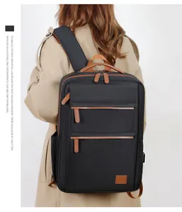 Detail of minimalist business laptop backpack with brown leather accents on commute model