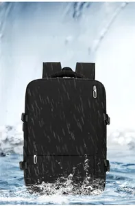Detail showing high-quality waterproof Oxford cloth material of the black travel backpack