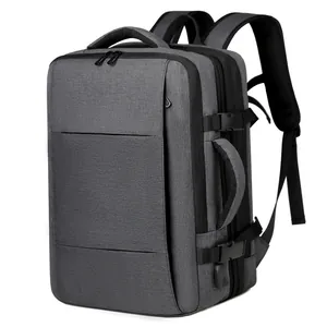 Expandable grey waterproof business travel backpack with USB charging port for 17-inch laptop