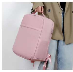 Close-up of a light pink commuter backpack with water-resistant fabric and side pocket