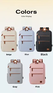 Detail view of colorful laptop backpacks with built-in USB charging ports and leather accents