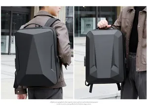Detail view of hard shell laptop backpack with USB charging port and integrated side lock