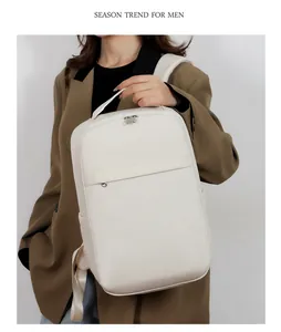 Detail of cream white leather business laptop backpack with smooth matte finish and metal zippers