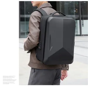 Detail view of hard shell laptop backpack with secure combination lock and USB charging port