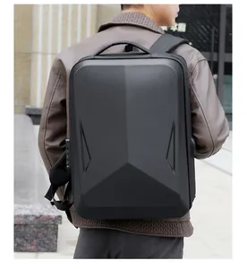 Detailed view of black hard shell gaming backpack with integrated TSA combination lock