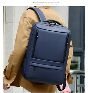 Deep blue waterproof laptop backpack with breathable straps shown on a model