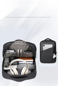 Detailed interior of a large black business backpack with laptop and tech compartments