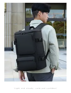 Detail of multi-functional black travel backpack with waterproof fabric and side buckles