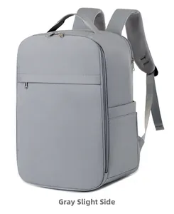Detail of grey laptop backpack showing breathable mesh shoulder straps and side pocket